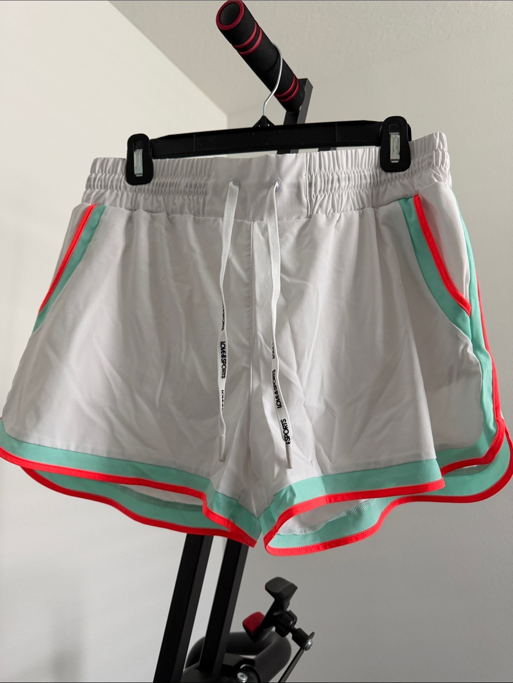 Love and Sports Women’s White Athletic Shorts with Mint & Coral Trim